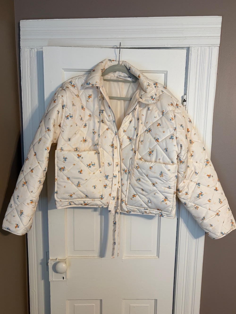No Boundaries Cream Quilted Floral Puffer Jacket with Blue & Yellow Blossoms